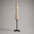 Parasol de jardin extérieur rond inclinable en polyester beige avec mât et pied en acier noir, Ø 250 × H 240 cm